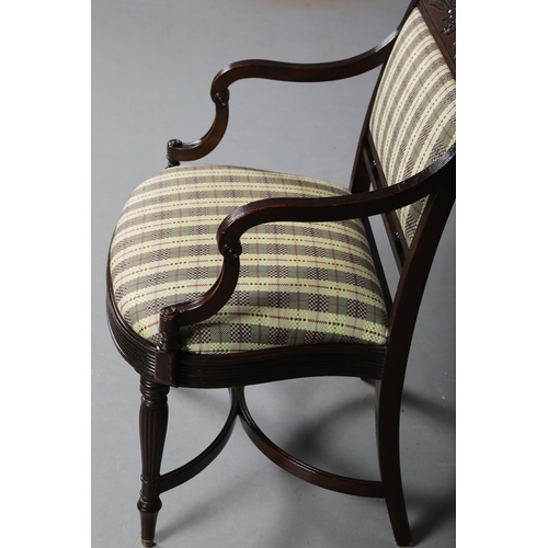 269 - GEORGIAN STYLE MAHOGANY OPEN ARMCHAIR. With a checked seat, reeded supports and shaped cross stretch... 
