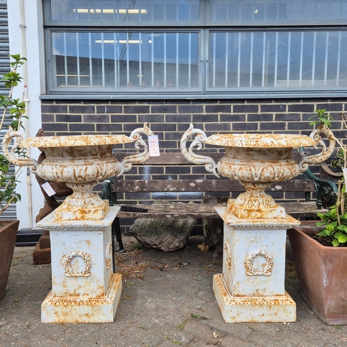 271 - CAMPANA STYLE GARDEN URNS ON STANDS, A PAIR. cast metal, each 98cm H at tallest approx. (2).