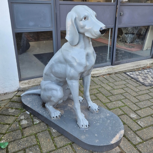 274 - SCULPTURAL DOGS, A NEAR PAIR. painted cast iron, 97cm H at tallest approx. (2).