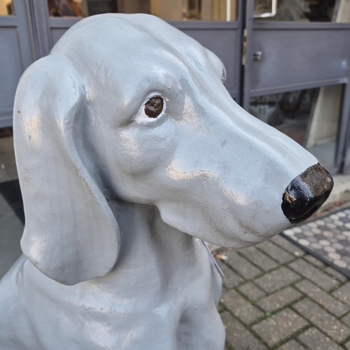 274 - SCULPTURAL DOGS, A NEAR PAIR. painted cast iron, 97cm H at tallest approx. (2).