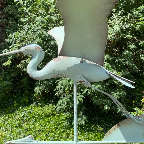 282 - FLYING CRANE WEATHER VANE IN VERDIGRIS FINISH METAL. 160cm H x 87cm W x 60cm D.