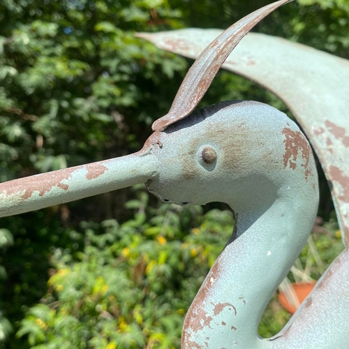 282 - FLYING CRANE WEATHER VANE IN VERDIGRIS FINISH METAL. 160cm H x 87cm W x 60cm D.