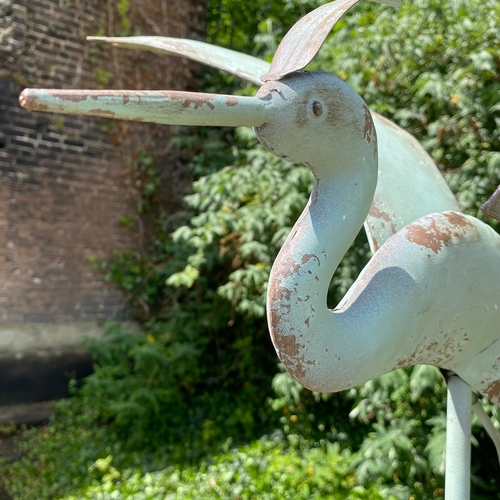 282 - FLYING CRANE WEATHER VANE IN VERDIGRIS FINISH METAL. 160cm H x 87cm W x 60cm D.