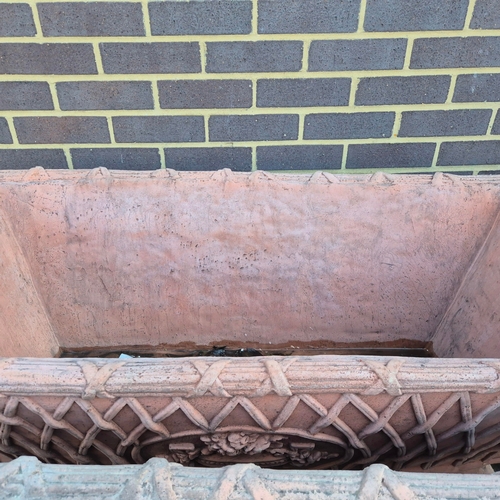 283 - FAUX TERRACOTTA TROUGH PLANTERS, A PAIR. lattice detail, 117cm x 54cm x 54cm each approx. (2) CITES ... 