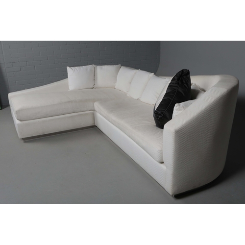 289 - CORNER SOFA. chevron patterned upholstery.