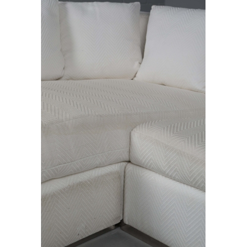 289 - CORNER SOFA. chevron patterned upholstery.