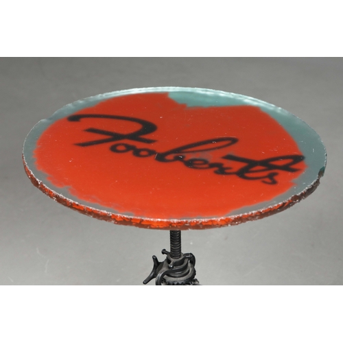 296 - CUSTOM SIDE TABLE WITH GLASS TOP ON INDUSTRIAL CAST IRON BASE. 64cm H x 60cm W.