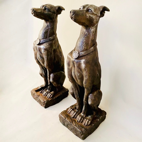 299 - PAIR OF FAUX STONE DOGS. 80cm H x 23cm W x 26cm D.