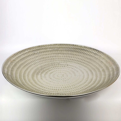 155 - A LARGE FINK CERAMIC PLATE IN A METALIC NICKEL GLAZE. with a repeat notch design, 60cm diam. approx.... 