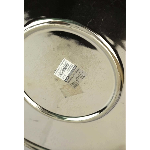 155 - A LARGE FINK CERAMIC PLATE IN A METALIC NICKEL GLAZE. with a repeat notch design, 60cm diam. approx.... 