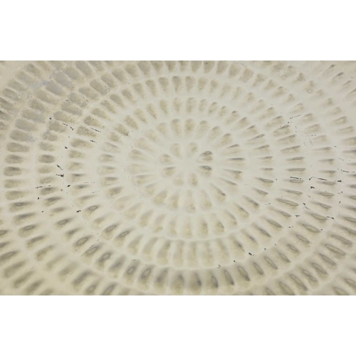 155 - A LARGE FINK CERAMIC PLATE IN A METALIC NICKEL GLAZE. with a repeat notch design, 60cm diam. approx.... 