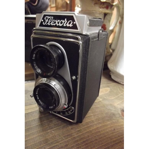 105 - Lipca 'Flexora' twin lens camera with leather case.