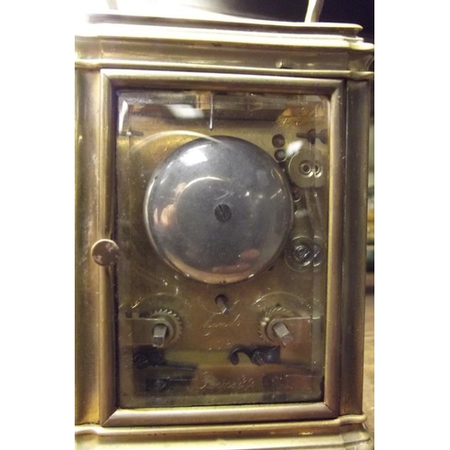 120 - Small late 19th Century English gilded brass cased carriage clock, the repeat movement striking on a... 