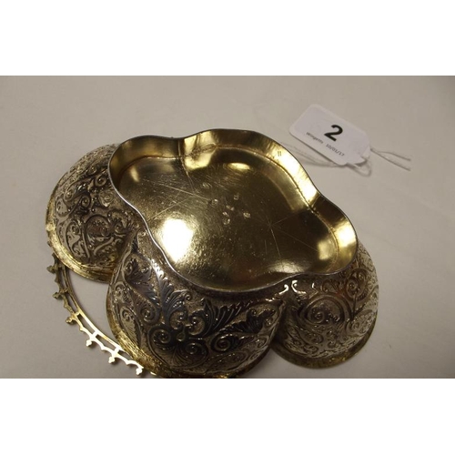 2 - Victorian silver gilt bon-bon dish with pierced swing handle, the shaped body with chased decoration... 