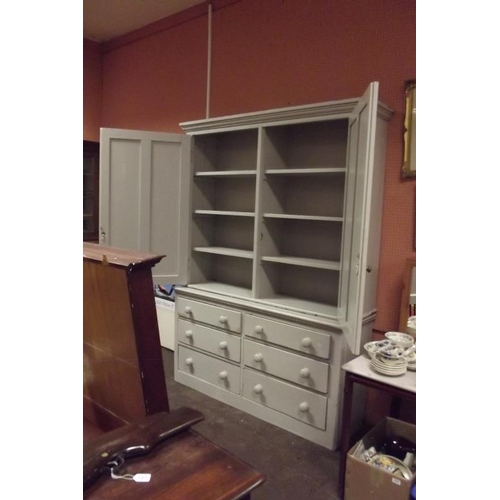 322 - Painted pine housekeeper's cupboard, ogive cornice over pair of panel doors enclosing a shelf lined ... 