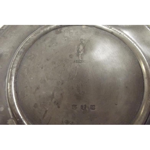 38 - Pair of antique pewter warmer plates with side handles, London touchmarks.