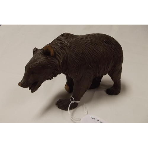 7 - Black Forest carved bear, 4 in. high (fault to one ear and front paw).