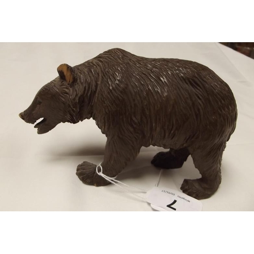 7 - Black Forest carved bear, 4 in. high (fault to one ear and front paw).