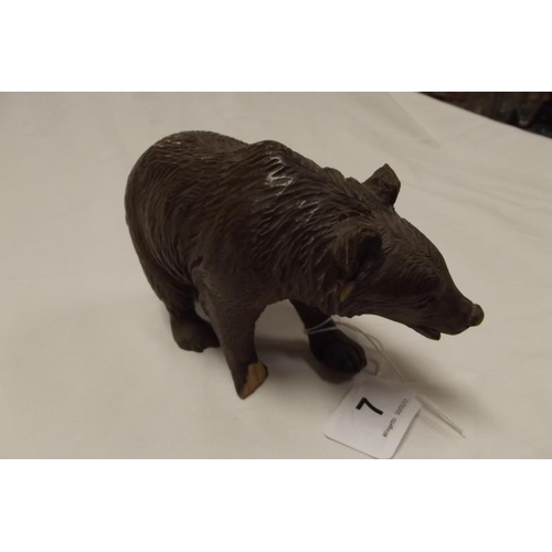 7 - Black Forest carved bear, 4 in. high (fault to one ear and front paw).