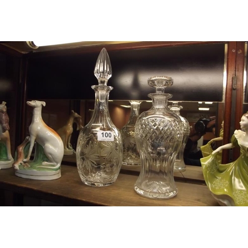 100 - Two cut glass decanters with stoppers.