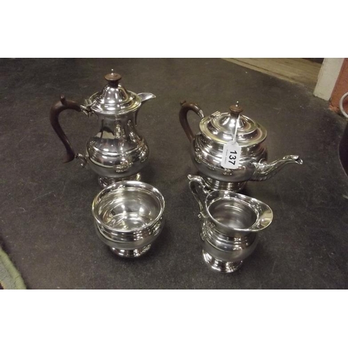 137 - George V silver four piece tea service of plain circular form, London 1922, approximately 44 ozs. to... 