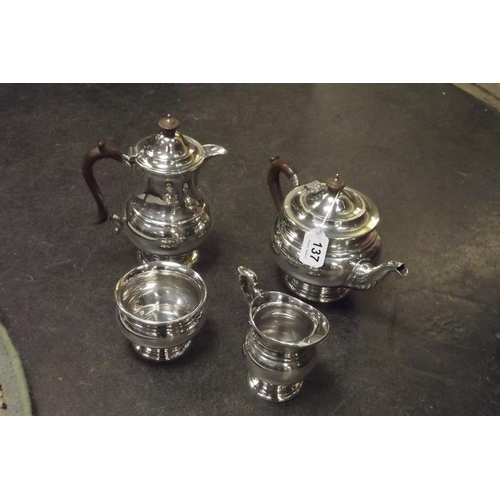 137 - George V silver four piece tea service of plain circular form, London 1922, approximately 44 ozs. to... 