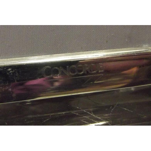 145 - Rectangular silver-faced photograph frame, engraved Concorde, 4.25 in. x 3.25 in., and one other fra... 
