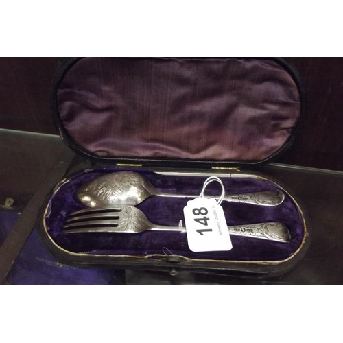148 - Christening set, spoon and fork in plush fitted leather case.