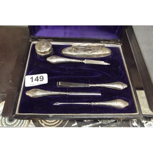 149 - Silver cased manicure set, six pieces, in plush lined case.