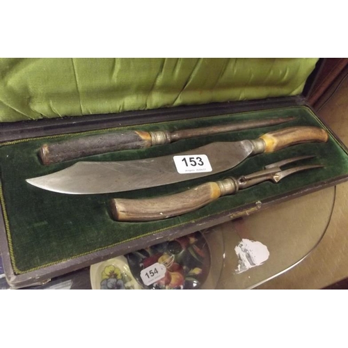 153 - Three piece antler-handled carving set, in plush lined case.