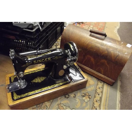 192 - Singer sewing machine, electric, in oak case.