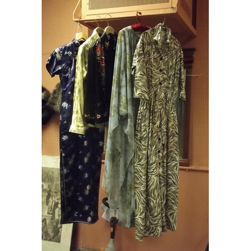 338 - Three Oriental jackets, floral dress, and one other dress.