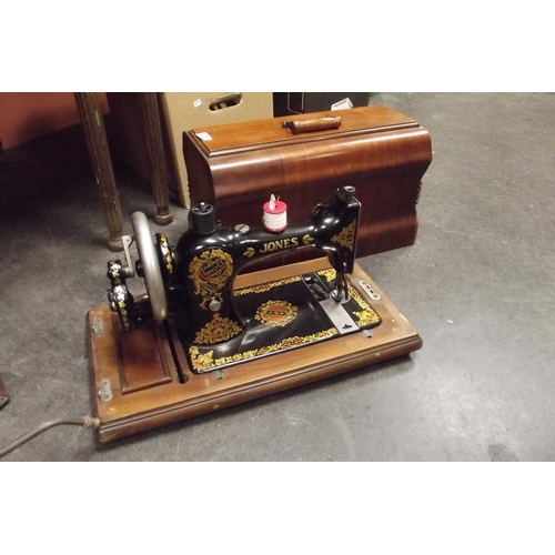 65 - Hand sewing machine in wooden case.