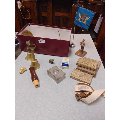 112 - Scale model soldier figure, two brass bells, etc.