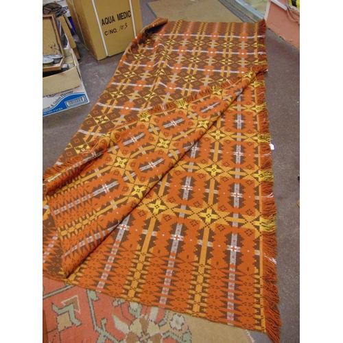 153 - Brynkir Welsh woollen blanket, orange/brown/yellow geometric pattern, fringed at two ends, approxima... 