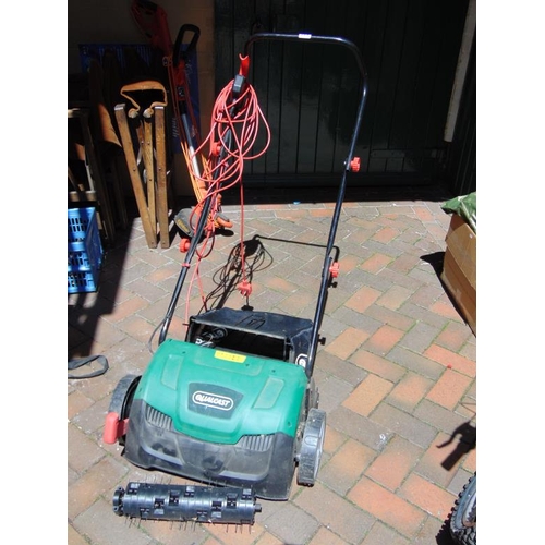 213 - Qualcast electric lawn rake/scarifier.