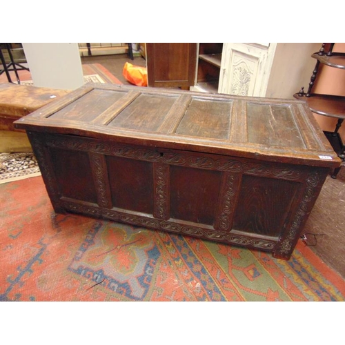 291 - Antique oak coffer having lift up quadruple panel and front, 22 in. x 50 in. x 25 in. deep.