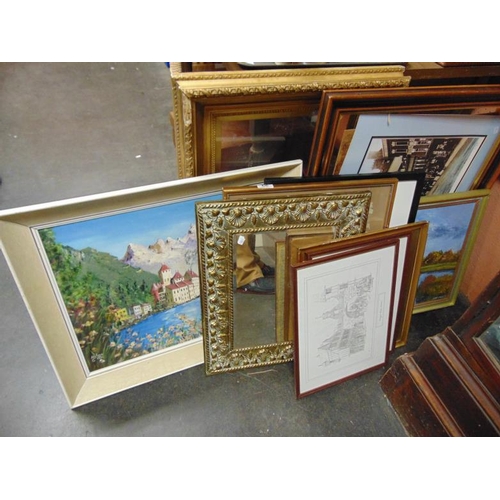 66 - Various framed and glazed prints, rectangular embossed brass framed wall mirror, etc.