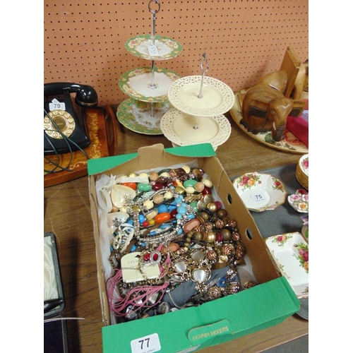 77 - Two cakestands, and various costume jewellery.