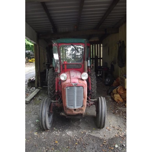 102 - Massey-Ferguson 35X 1965 tractor with loader and cab.