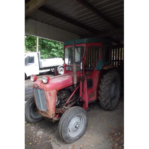 102 - Massey-Ferguson 35X 1965 tractor with loader and cab.