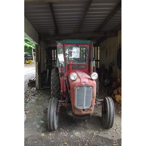 102 - Massey-Ferguson 35X 1965 tractor with loader and cab.