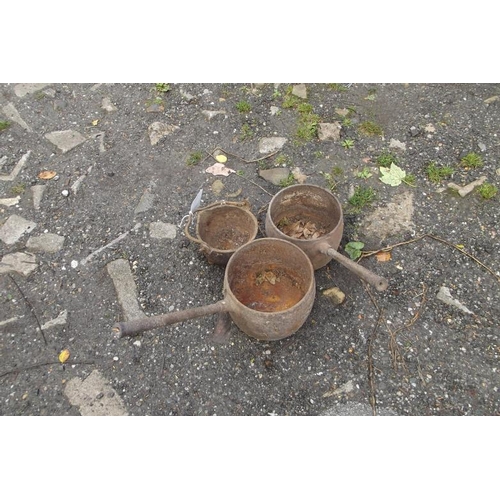 57 - Two antique cast iron saucepans, and a cast metal glue pot.