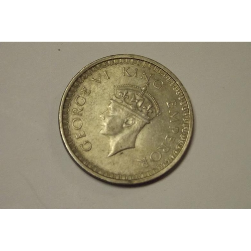 164 - George VI silver One Rupee India 1942.