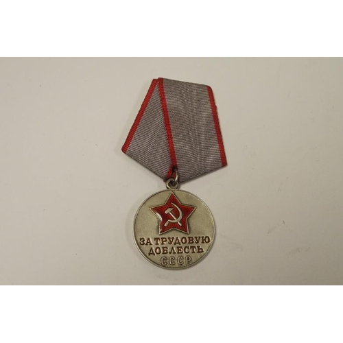 18 - WWII Soviet Russian silver medal for Labour Valour (grey and red ribbon).