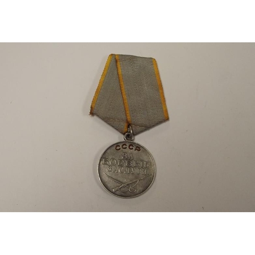 19 - 1940/45 Soviet Russian silver medal for Combat Service (grey and yellow ribbon).