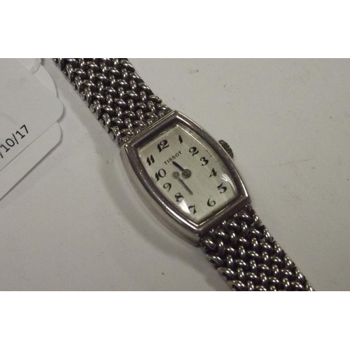 21 - Tissot silver cased ladies wristwatch, on flexible link silver bracelet, hallmarked 1975.