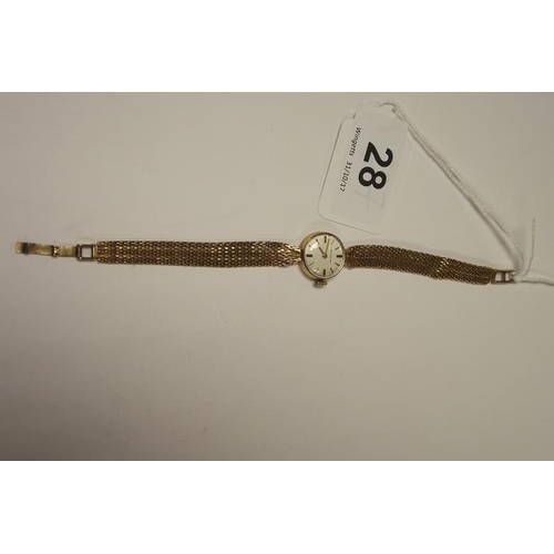 28 - Bulova 9 ct. yellow gold cased ladies wristwatch on 9 ct. yellow gold flexible link bracelet, approx... 