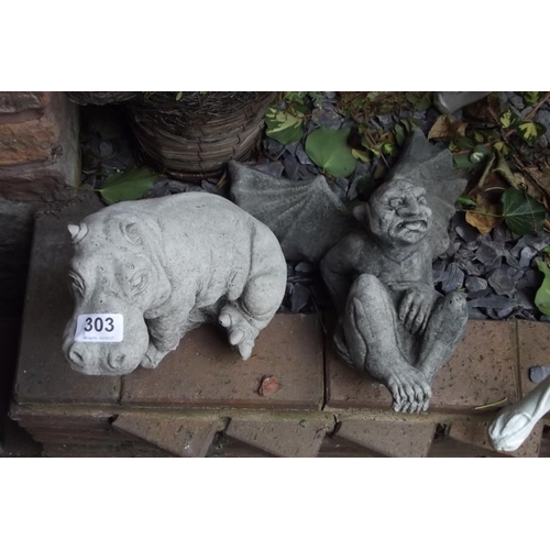 303 - Modern stoneware garden statue modelled as a hippopotamus, and one other. (2)