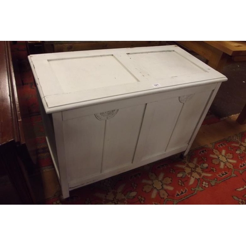 321 - Painted blanket box having lift-up lid and panelled decoration, 26 in. x 35 in. x 17 in. deep.